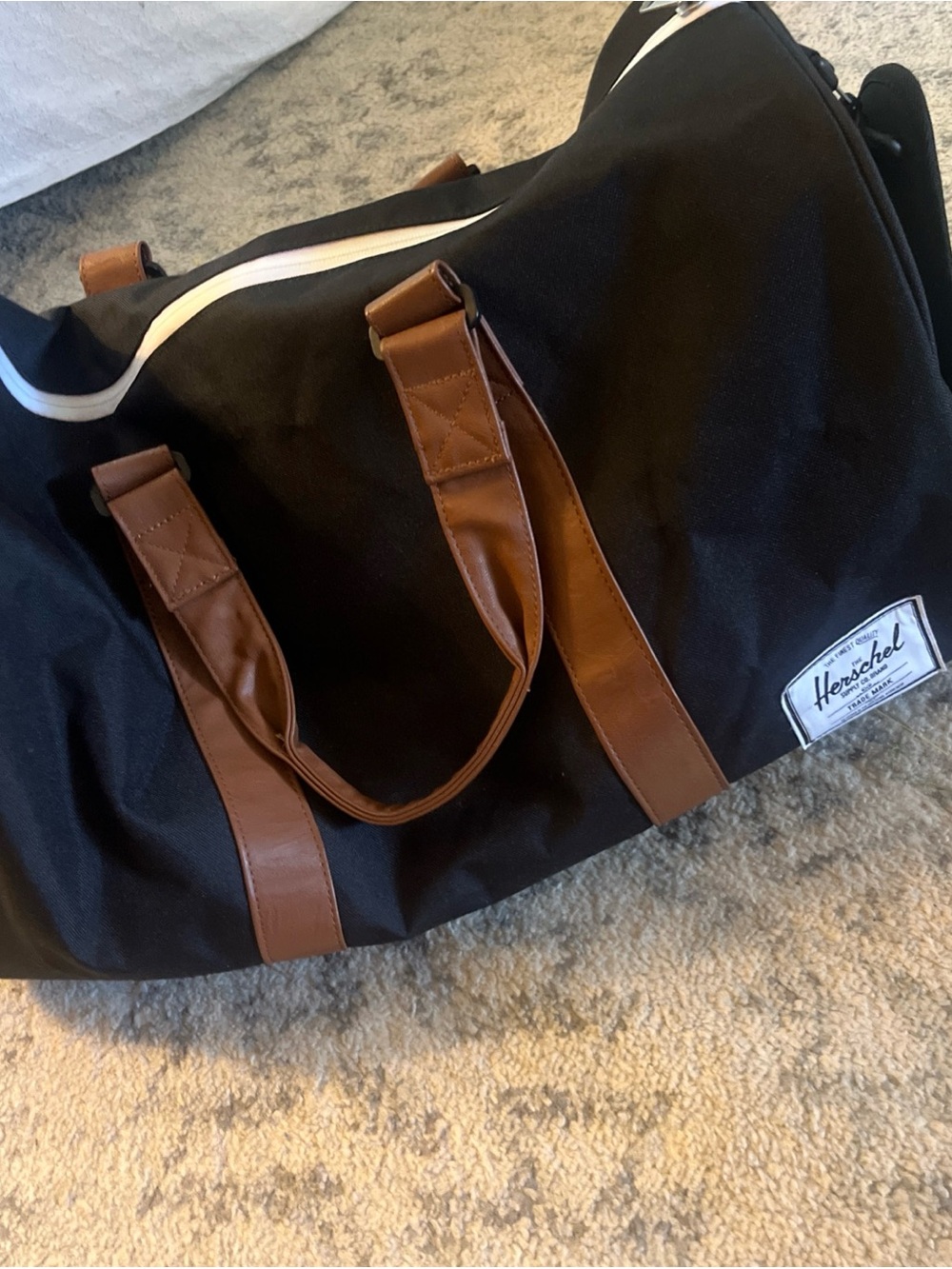 Herschel Supply Company Black Duffel with Brown Handles